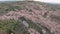 Amazing italian town Montalcino in mountains in summer day, aerial view, picturesque old living houses
