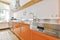 Amazing kitchen with orange kitchen set