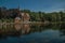 Amazing lake surrounded by greenery and old building