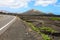 Amazing landscape of Lanzarote Island with volcanic black ground with the vineyards of La Geria, Canary Islands, Spain