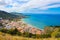 Amazing landscape surrounding picturesque coastal city Cefalu in Sicily, Italy. The city located on Tyrrhenian coast is popular