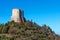 Amazing landscape of the Tuscan countryside with the medieval fortress Rocca of Tentennano on the hill in winter