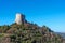 Amazing landscape of the Tuscan countryside with the medieval fortress Rocca of Tentennano on the hill in winter