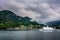 Amazing landscape view with fjord, mountains and ferry. Norway