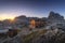 Amazing landscapes view of hut and mountain on sunrise morning background from Dolomites, Italy.