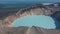 An amazing lifeless acid lake in the crater of an extinct volcano.