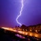 Amazing lightning view above night city.