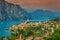 Amazing Malcesine tourist resort and high mountains, Garda lake, Italy