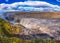 Amazing nature landscape, stunning Dettifoss waterfall with rocky canyon and blue cloudy sky Iceland. Scenic panoramic aerial view