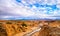 Amazing nature view of stone desert with mountains peaks and beautiful clouds. Location: Morocco, Africa. Artistic picture. Beauty