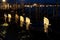 Amazing night urban landscape from venice city canal with gondolas anchored on grand canal in venice