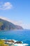 Amazing northern coast of Madeira Island, Portugal photographed by village Seixal. Beautiful steep cliffs covered by green forest