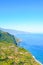 Amazing northern coast of the Portuguese Madeira island. Sao Jorge village surrounded by green hills and tropical forest, cliffs