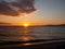 Amazing orange sunset on a beautiful empty beach