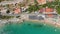 Amazing overhead aerial view of Cavoli Beach, Elba Island in summer season, Italy. Slow motion