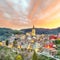 Amazing Panorama of the belltower and the village in the valley at early sunrise