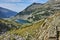 Amazing Panorama with green hils and Mitrovo lake, Pirin Mountain