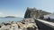 Amazing panorama of medieval Argonese castle and Tyrrhenian sea, tourism