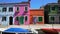Amazing panorama of tidy colorful houses in Burano, Venice canal, architecture