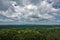 Amazing panorama from the top of Mount Sigiriya, Sri Lanka. The endless valley is covered with dense green jungle
