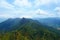 Amazing panorama view from the o Gunung Raya mountain, the highest point in Langkawi, Malaysia. Distant mountains in the mist and