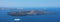 Amazing panoramic banner view from Santorini Island with the caldera of volcano and cruise ships in the Mediterranean sea, Greece