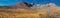 Amazing panoramic landscape of Mount Erciyes. View of the an inactive volcano: mountain range, stony slopes, rocky peaks formed by