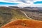 Amazing panoramic landscape of volcano craters in Timanfaya national park. Popular touristic attraction in Lanzarote island,