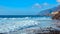 Amazing panoramic view on Canary islands. Ocean waves on the coast of Tenerife. Seaside resort and cliffs at summer day.