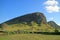 Amazing panoramic view of Rano Raraku volcano, the legendary Moai quarry with uncountable Moai statue ruins on the slope