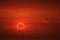 amazing phenomenon of total sun eclipse over cloud sunset red orange sky on the sea