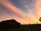 Amazing pink and orange sky Sunrise with barn