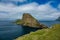 Amazing profile view of Tindholmur vertical cliff, Faroe Islands