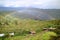 Amazing rainbow over the lower mountaintop village view from Kuelap ancient citadel in Amazonas region, northern Peru