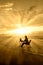 Amazing rays of light of woman study on beach