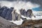 Amazing rocky mountains covered with clouds, Tre Cime di Lavaredo park