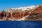Amazing Santorini view on white cave houses from the Aegean sea. Santorini, Greece