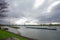 Amazing scene with long vessel - dry cargo ship in Rhine river in dusseldorf