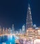 Amazing scenic view of the pool near Burj Khalifa Tallest Buidling and Dubai Mall at night