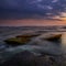 Amazing seascape with motion waves. Waterscape background. Moving water. Nature concept. Sunset scenery background. Long exposure