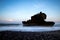 Amazing seascape. Sunrise at Yeh Gangga beach. Rock in the ocean. Waves captured with slow shutter speed. Long exposure with soft