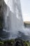 Amazing Seljalandfoss waterfall in sunny autumn day, Iceland. Famous tourist attraction