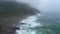 Amazing shot of the drone in the fall of Salalah, sea waves and rocks, Sultanate of Oman