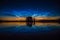 Amazing shot of a lake with the reflection of the mesmerizing sky at sunset