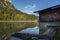 Amazing shot of a wooden house in the Ferchensee lake in Bavaria, Germany