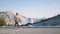 Amazing side view static shot of young happy man walking along epic mountain view at Yosemite national park slow motion.