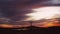 Amazing sky. A big plane is landing at the dusk, close up view. Airport lights, summer evening. Italy, no people around