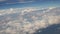 Amazing skyline view from airplane sky above the clouds