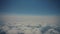 Amazing skyline view from airplane sky above the clouds