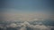 Amazing skyline view from airplane sky above the clouds